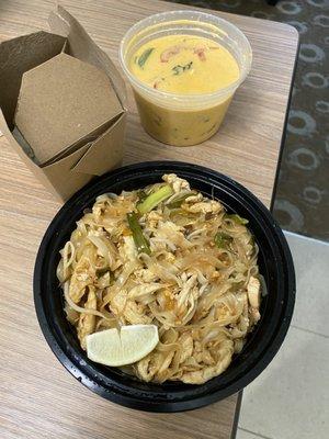 Take out order of Pad Thai and Red Curry. The side of rice is really tiny along with everything else (use the lime wedge for scale)