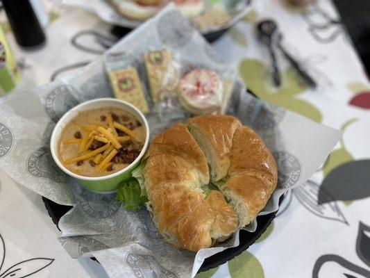 Potato loaded soup and chicken salad with grapes and apples.