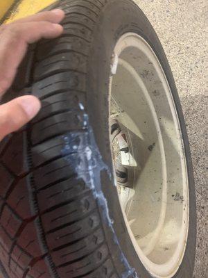 Helping a customer with a tire repair kit, they can be messy but can really save the day from a tire with a small nail puncture.