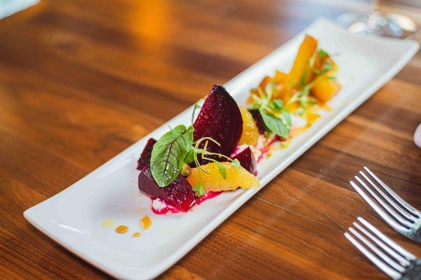 Ensalada de Betabel - roasted beet salad, orange, whipped goat cheese, ground pistachio, piloncillo-citrus gastrique