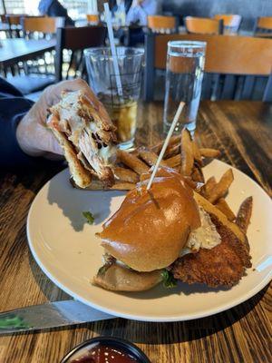 Half steak and cheese and half crispy chicken with fries.