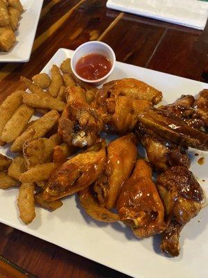 Buffalo and Cajun Jerk chicken Wings (12) with side