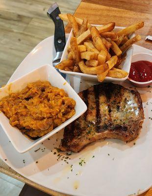 pork chop with fries and sweet potato casserole