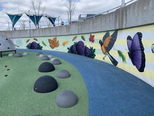 Playground walk way with mural.