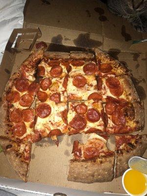 This is a ridiculous way to cut a pizza... some pieces are just crust.