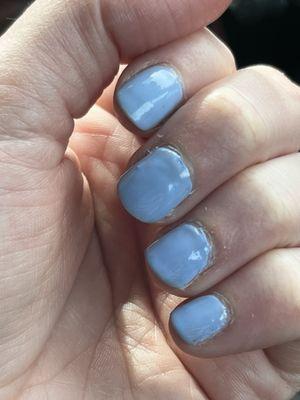 Gel manicure after a week. It's held on well but with the grow out the uneven edges are much more apparent