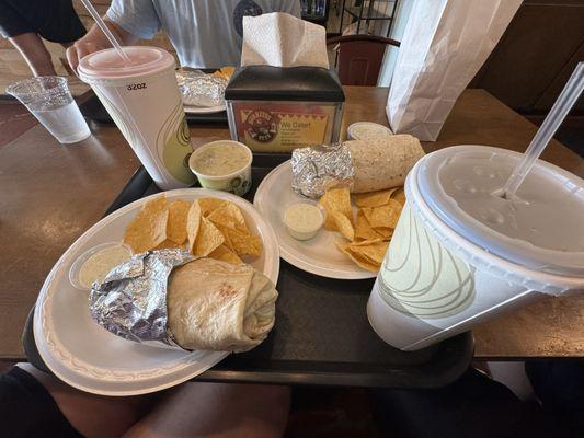 Steak and potato burrito, Double chicken burrito, jalapeno ranch, jalapeño queso, Coke, Hi-C fruit punch