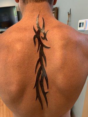 Tribal art tattoo.