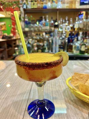 Happy Hour blended mango Margarita with tajin rim