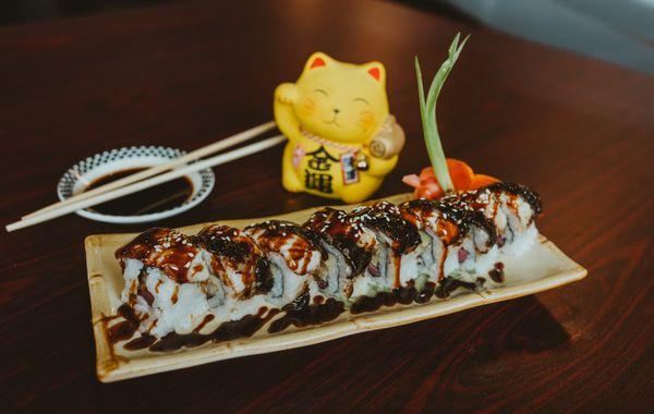 Dragon Roll - Shrimp Tempura, Avocado topped with Eel.