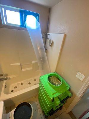 We had to place this dehumidifier in the bathroom and push out the air through the make-shift sealed window.