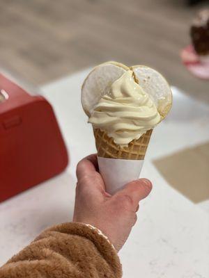 Lemon ice cream waffle cone with lemon cookie