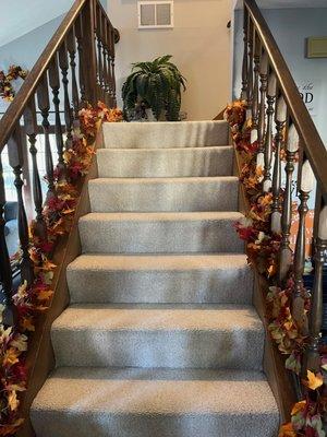 The staircase that turned out okay. Sorry for the lighting. The carpet looks good.