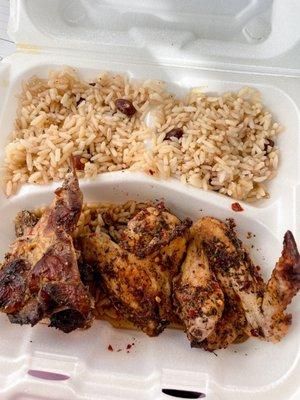 Jerk chicken. Sad looking rice. Originally ALL wings, i had to exchange some from my husbands order