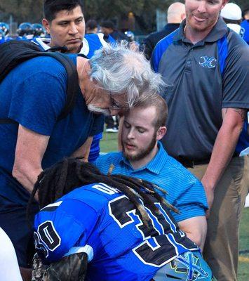 Dr. Forrest working sideline medical support for the Texas Xtreme semi-pro football team.