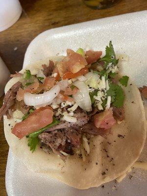 Brisket tacos with homemade pico. Super delicious. Not too much smoke and the tortillas are fluffy. Super good.