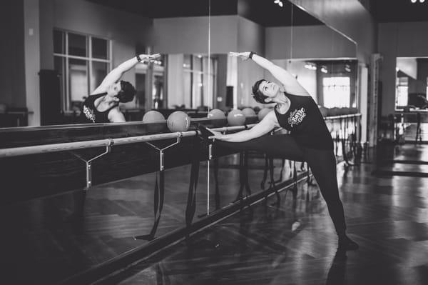 We do a barre stretch before the intense thigh work.