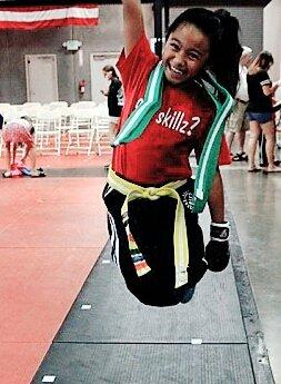 Happy she got her green belt