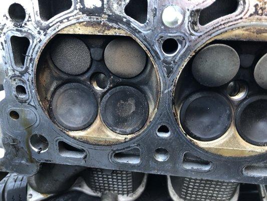 Burned valves caused this car to run rough, normal wear and tear. Time for a valve job.