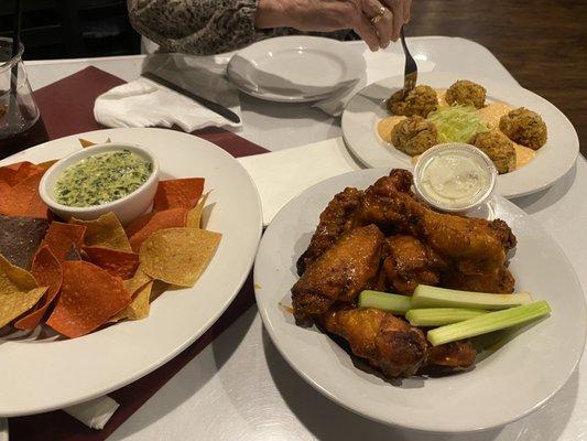 Buffalo Chicken Wings, spinach artichoke dip, Our Very Own Crab Cakes