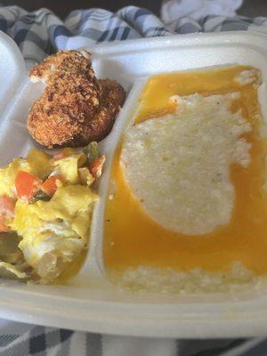 Salmon cakes, eggs and cheese grits