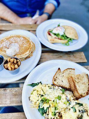 Clockwise: apple pancakes, breakfast sandwich and scramble