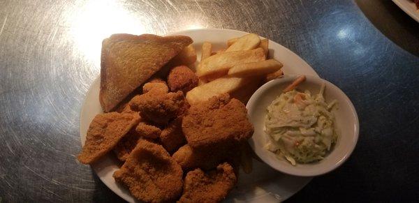 Catfish with fries, hush puppies, slaw and texas toast. Best fried catfish  I' ve ever had.