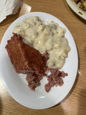 Biscuit and gravy, and corn beef hash! Very filling!