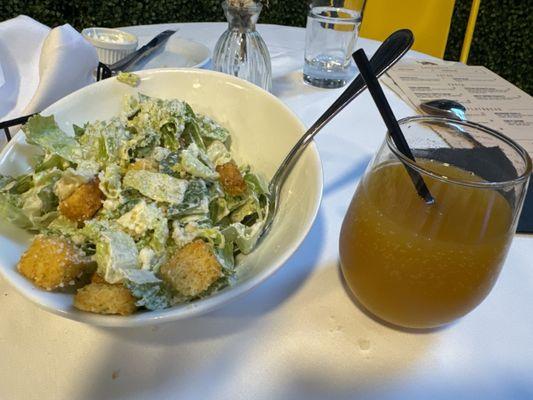 Peach  Bellini and a Caesar salad