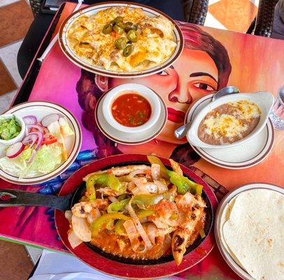 Nachos, salsa and chicken fajitas.