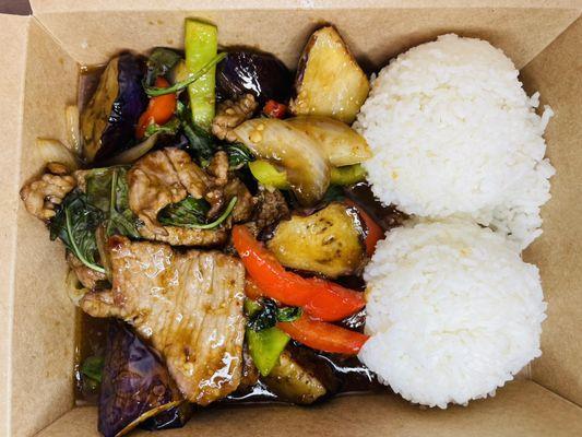 Stir fried eggplant of protein stir fried with eggplant,bell pepper,onion and basil comes with 2 scoops of jasmine rice