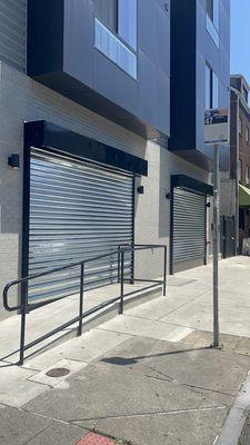 3 Rolling gates all close on a smoke shop on south st