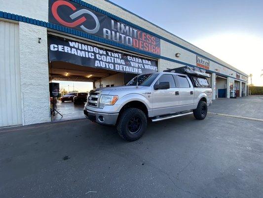 Claybar and wax and paint sealant.