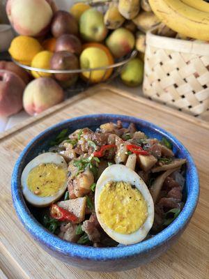 This dish is called "kaw sach chruk". Which is a braised pork stew. Best served over jasmine rice. So delicious and comforting!