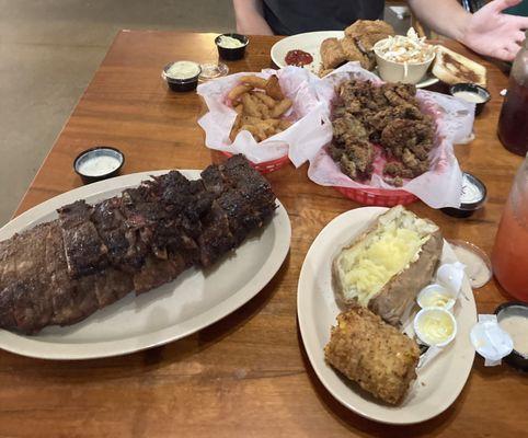 Full rack of ribs, baked potato (I asked for no sour cream), fried corn on the cob Fried fish, coleslaw, fried okra