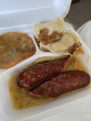 Kielbasa, potato pancake and perogi