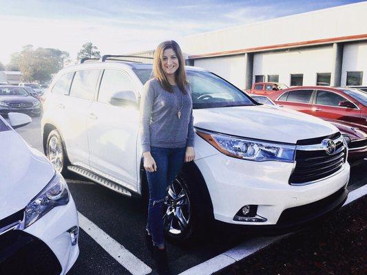 Happy client with her new 2016 Toyota Highlander Limited Platinum AWD