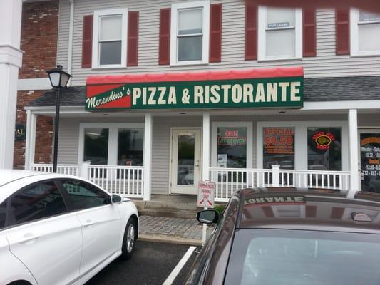 Storefront. In a plaza with decent parking.