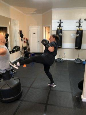 Learning kickboxing push kick