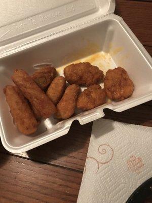 Appetizer combo thrown together carelessly in a box. I've had better at a high school concession stand. No dipping sauce either!