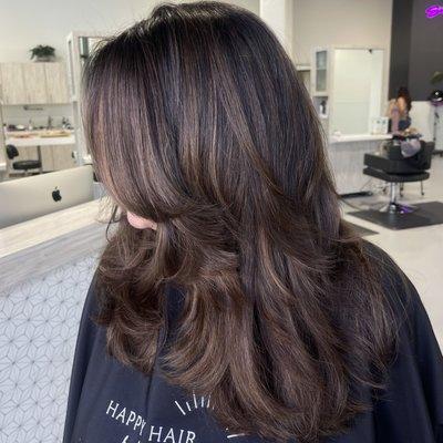 Bronde highlights + grey coverage. Heavy layered cut