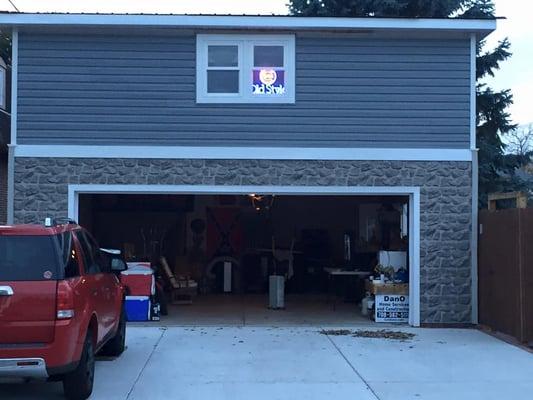 2 story garage with the mancave