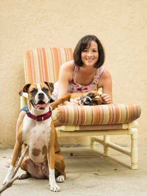 Beth and her loving boxers Layla and Luna.