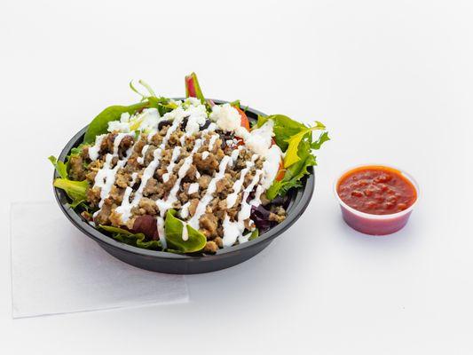 Combination of beef & lamb cooked and chopped to perfection. Served on a bed of basmati rice, spring mix & our signature white sauce.