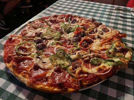 Medium Pizza with sausage, pepperoni, onions, and peppers