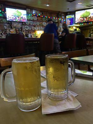 Ice cold beer  served in frosted mugs