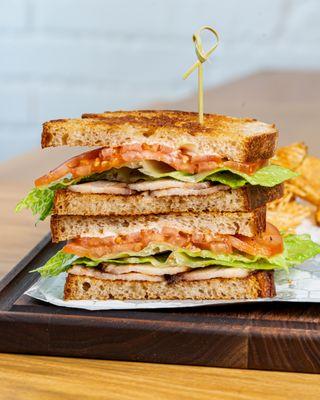 BLT made with bacon smoked in house and served with a side of house made potato chips