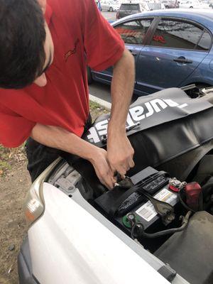 David installing my new battery