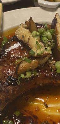 Asian style pork chop with shiitake mushrooms and a zesty glaze.