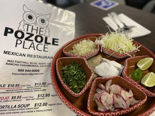 The fixings for the pozole. You can ask for tomatoes too if you like.